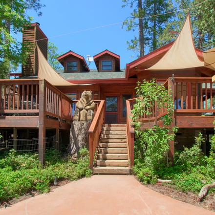 Willow Cove Lodge exterior with bear statue