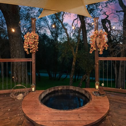 Halfling House hot tub on deck at sunset