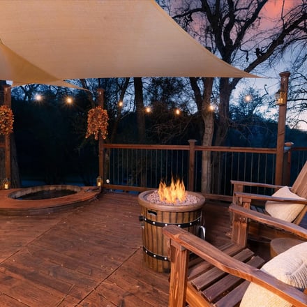 Halfling House fire pit with Adirondack chairs